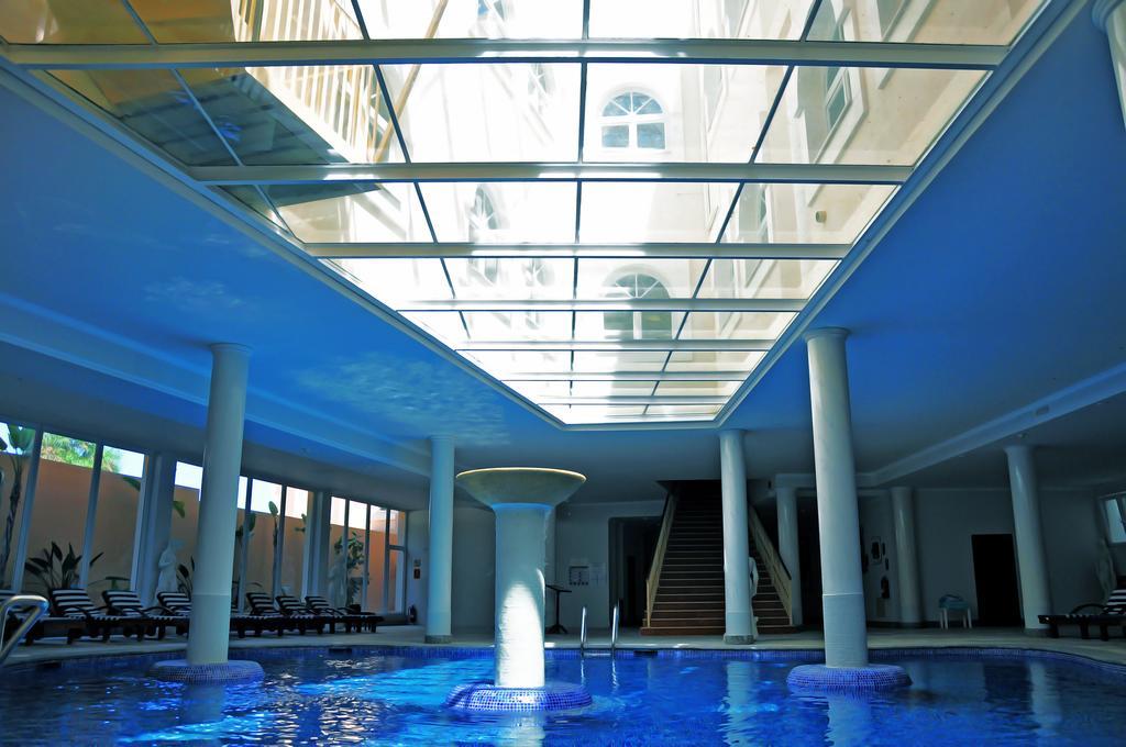 Grand Hotel Palladium Santa Eulalia Del Rio Exterior photo